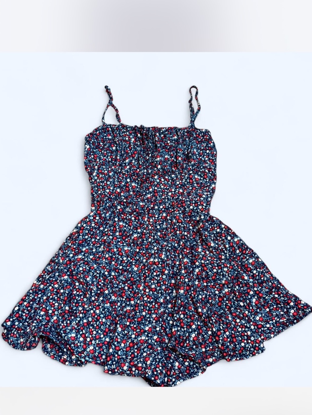 Francesca's Collections Navy Floral Romper with Red and White Flowers
